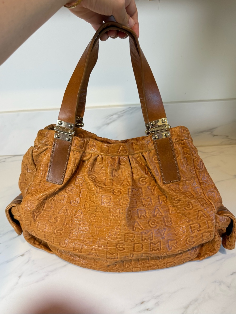 Marc Jacob’s tan leather purse